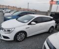Белый Рено Меган, объемом двигателя 1.5 л и пробегом 227 тыс. км за 9444 $, фото 1 на Automoto.ua