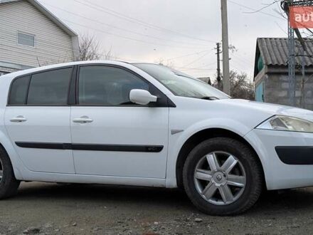 Рено Меган 2005 у Карнаухівка на Automoto.ua Білий Рено Меган, об'ємом двигуна 1.46 л та пробігом 260 тис. км за 4300 $, фото 1 на Automoto.ua
