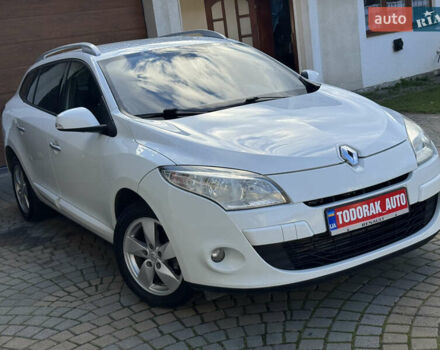 Белый Рено Меган, объемом двигателя 1.6 л и пробегом 238 тыс. км за 6450 $, фото 1 на Automoto.ua