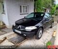 Черный Рено Меган, объемом двигателя 1.4 л и пробегом 257 тыс. км за 5000 $, фото 3 на Automoto.ua