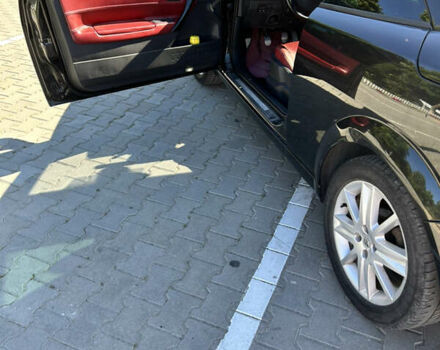 Чорний Рено Меган, об'ємом двигуна 2 л та пробігом 193 тис. км за 5350 $, фото 3 на Automoto.ua