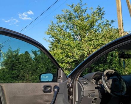 Черный Рено Меган, объемом двигателя 1.4 л и пробегом 230 тыс. км за 3600 $, фото 4 на Automoto.ua