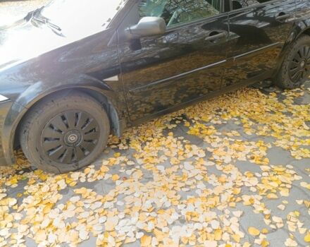 Черный Рено Меган, объемом двигателя 1.6 л и пробегом 238 тыс. км за 4800 $, фото 3 на Automoto.ua