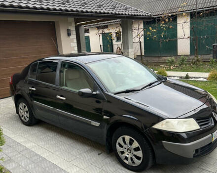 Черный Рено Меган, объемом двигателя 1.6 л и пробегом 158 тыс. км за 4250 $, фото 1 на Automoto.ua