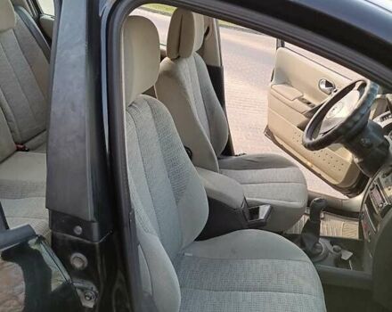 Черный Рено Меган, объемом двигателя 1.6 л и пробегом 210 тыс. км за 4300 $, фото 3 на Automoto.ua