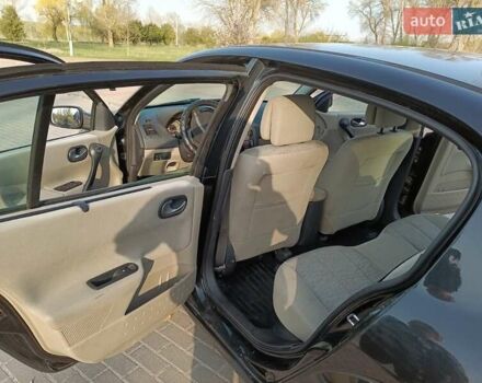 Черный Рено Меган, объемом двигателя 1.6 л и пробегом 210 тыс. км за 4300 $, фото 7 на Automoto.ua