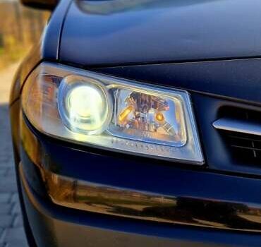 Рено Меган 2008 в Черновцах на Automoto.ua Черный Рено Меган, объемом двигателя 1.4 л и пробегом 200 тыс. км за 4000 $, фото 2 на Automoto.ua