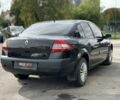 Рено Меган 2009 у Львові на Automoto.ua Чорний Рено Меган, об'ємом двигуна 1.4 л та пробігом 163 тис. км за 4999 $, фото 9 на Automoto.ua