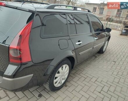 Черный Рено Меган, объемом двигателя 1.6 л и пробегом 206 тыс. км за 6300 $, фото 3 на Automoto.ua