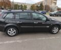 Черный Рено Меган, объемом двигателя 1.6 л и пробегом 234 тыс. км за 5021 $, фото 1 на Automoto.ua