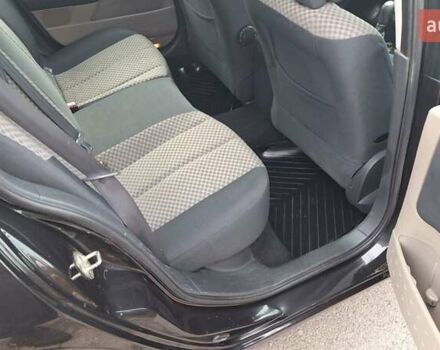 Черный Рено Меган, объемом двигателя 1.6 л и пробегом 230 тыс. км за 4950 $, фото 20 на Automoto.ua