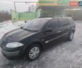 Черный Рено Меган, объемом двигателя 1.6 л и пробегом 200 тыс. км за 5000 $, фото 1 на Automoto.ua