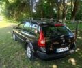 Черный Рено Меган, объемом двигателя 1.4 л и пробегом 207 тыс. км за 3800 $, фото 1 на Automoto.ua