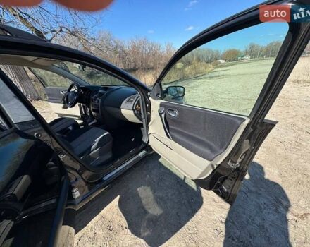 Черный Рено Меган, объемом двигателя 1.6 л и пробегом 168 тыс. км за 4950 $, фото 60 на Automoto.ua