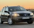 Черный Рено Меган, объемом двигателя 2 л и пробегом 200 тыс. км за 4350 $, фото 1 на Automoto.ua