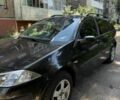 Черный Рено Меган, объемом двигателя 1.4 л и пробегом 205 тыс. км за 4500 $, фото 1 на Automoto.ua