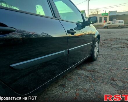 Черный Рено Меган, объемом двигателя 1.4 л и пробегом 216 тыс. км за 5000 $, фото 5 на Automoto.ua