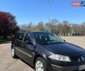 Черный Рено Меган, объемом двигателя 1.6 л и пробегом 326 тыс. км за 4500 $, фото 1 на Automoto.ua