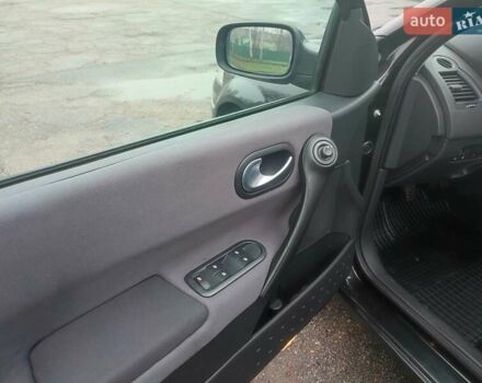 Чорний Рено Меган, об'ємом двигуна 1.6 л та пробігом 163 тис. км за 5600 $, фото 23 на Automoto.ua