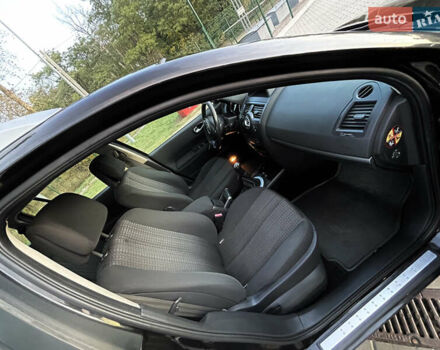 Черный Рено Меган, объемом двигателя 1.6 л и пробегом 209 тыс. км за 5699 $, фото 23 на Automoto.ua