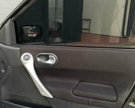 Черный Рено Меган, объемом двигателя 1.6 л и пробегом 220 тыс. км за 4499 $, фото 28 на Automoto.ua