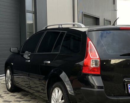 Черный Рено Меган, объемом двигателя 1.6 л и пробегом 220 тыс. км за 4499 $, фото 13 на Automoto.ua