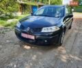 Черный Рено Меган, объемом двигателя 1.6 л и пробегом 186 тыс. км за 6100 $, фото 1 на Automoto.ua