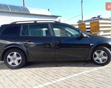 Черный Рено Меган, объемом двигателя 1.6 л и пробегом 206 тыс. км за 5999 $, фото 1 на Automoto.ua