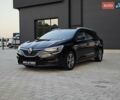Черный Рено Меган, объемом двигателя 1.5 л и пробегом 176 тыс. км за 18900 $, фото 1 на Automoto.ua