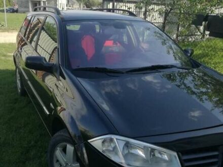 Рено Меган 2004 в Новояворовск на Automoto.ua Черный Рено Меган, объемом двигателя 1.46 л и пробегом 267 тыс. км за 4900 $, фото 1 на Automoto.ua
