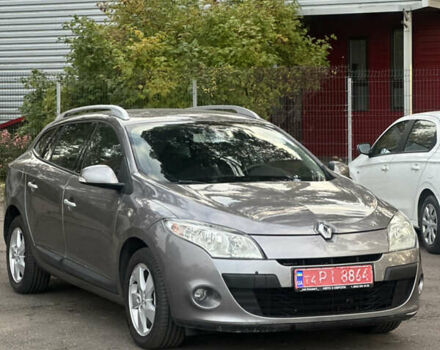 Коричневый Рено Меган, объемом двигателя 1.6 л и пробегом 210 тыс. км за 7700 $, фото 1 на Automoto.ua