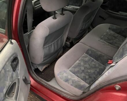 Красный Рено Меган, объемом двигателя 1.6 л и пробегом 260 тыс. км за 1050 $, фото 3 на Automoto.ua