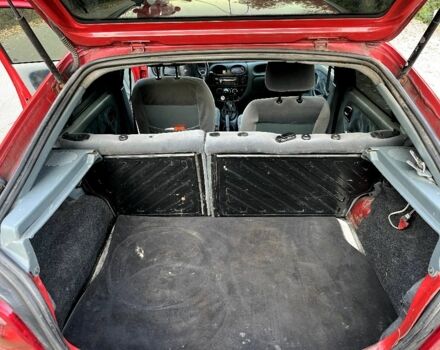 Красный Рено Меган, объемом двигателя 1.4 л и пробегом 300 тыс. км за 1299 $, фото 13 на Automoto.ua