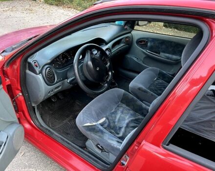 Красный Рено Меган, объемом двигателя 1.4 л и пробегом 300 тыс. км за 1299 $, фото 9 на Automoto.ua