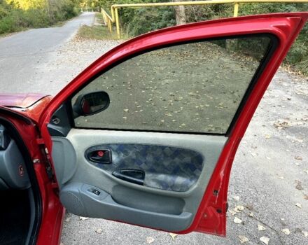 Красный Рено Меган, объемом двигателя 1.4 л и пробегом 300 тыс. км за 1299 $, фото 14 на Automoto.ua