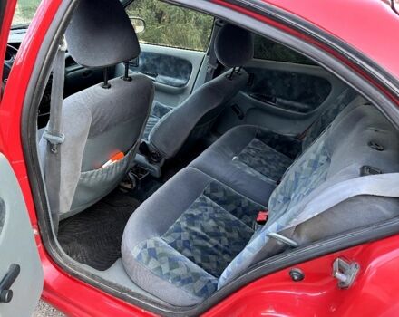 Красный Рено Меган, объемом двигателя 1.4 л и пробегом 300 тыс. км за 1299 $, фото 12 на Automoto.ua