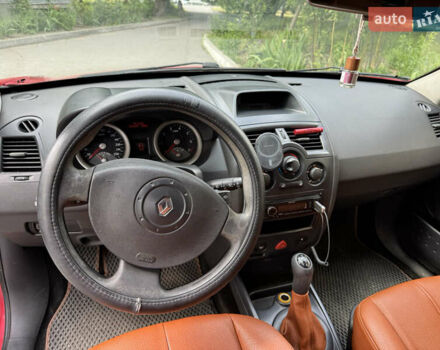 Красный Рено Меган, объемом двигателя 1.6 л и пробегом 285 тыс. км за 4500 $, фото 7 на Automoto.ua