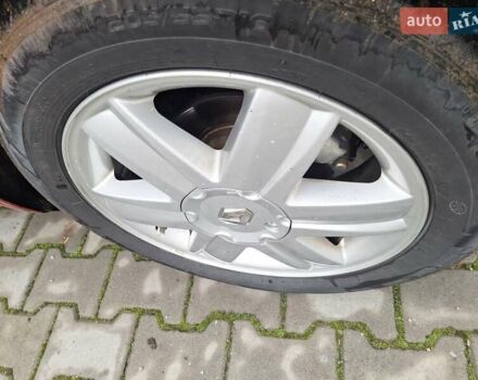 Красный Рено Меган, объемом двигателя 1.4 л и пробегом 206 тыс. км за 2300 $, фото 8 на Automoto.ua