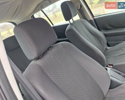 Красный Рено Меган, объемом двигателя 1.4 л и пробегом 206 тыс. км за 2300 $, фото 23 на Automoto.ua