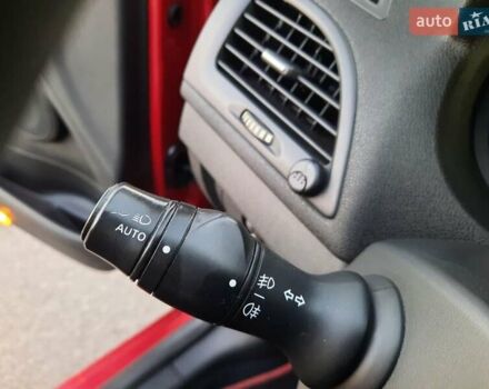 Рено Меган 2009 в Полтаве на Automoto.ua Красный Рено Меган, объемом двигателя 1.6 л и пробегом 178 тыс. км за 7300 $, фото 34 на Automoto.ua