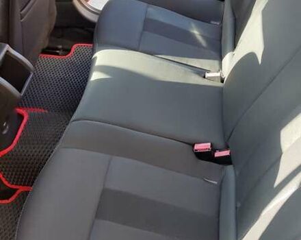 Рено Меган 2010 в Ужгороде на Automoto.ua Красный Рено Меган, объемом двигателя 1.4 л и пробегом 146 тыс. км за 6300 $, фото 16 на Automoto.ua