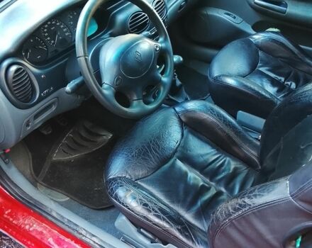 Красный Рено Меган, объемом двигателя 1.6 л и пробегом 250 тыс. км за 1750 $, фото 4 на Automoto.ua