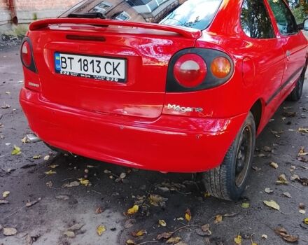 Красный Рено Меган, объемом двигателя 1.6 л и пробегом 250 тыс. км за 1750 $, фото 3 на Automoto.ua