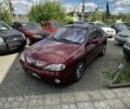 Красный Рено Меган, объемом двигателя 2 л и пробегом 220 тыс. км за 2700 $, фото 1 на Automoto.ua