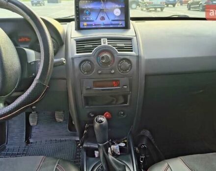 Красный Рено Меган, объемом двигателя 1.4 л и пробегом 251 тыс. км за 5000 $, фото 4 на Automoto.ua