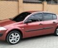 Рено Меган 2005 в Красилове на Automoto.ua Красный Рено Меган, объемом двигателя 1.4 л и пробегом 166 тыс. км за 3300 $, фото 1 на Automoto.ua