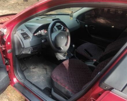 Красный Рено Меган, объемом двигателя 1.4 л и пробегом 150 тыс. км за 3500 $, фото 4 на Automoto.ua