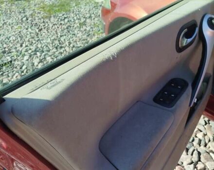 Красный Рено Меган, объемом двигателя 1.6 л и пробегом 242 тыс. км за 4700 $, фото 10 на Automoto.ua