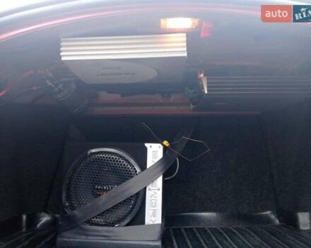 Красный Рено Меган, объемом двигателя 1.6 л и пробегом 240 тыс. км за 5200 $, фото 6 на Automoto.ua