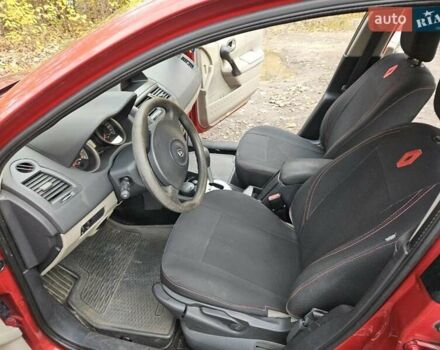 Красный Рено Меган, объемом двигателя 1.6 л и пробегом 286 тыс. км за 4000 $, фото 7 на Automoto.ua